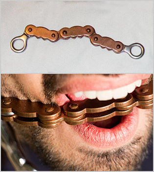 Bike chain horse bit. The mouthpiece (top) and me wearing it (bottom)