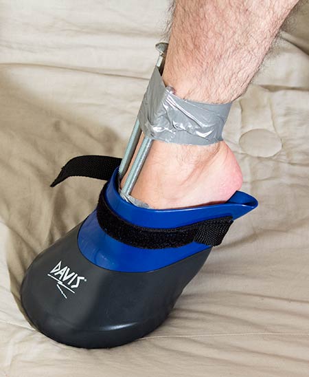 Insert or force the foot with taped bolt into the soaking boot