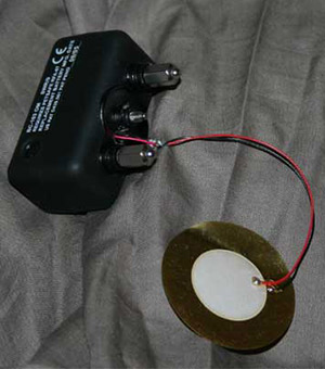 Shock collar with enhanced piezo detector surface