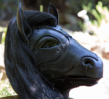 Black leather horse mask by Bob Basset studios.