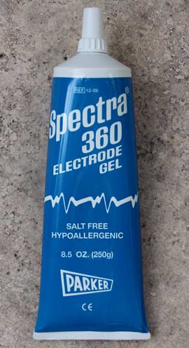 A tube of electrode gel. It is inexpensive and really helps electrical contact