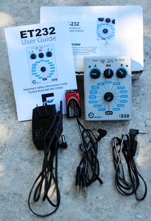 The ErosTek 232 unit and all the accessories included in the box