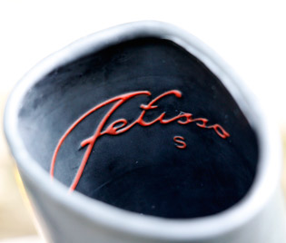 The Fetisso logo on the inside top of the gloves.